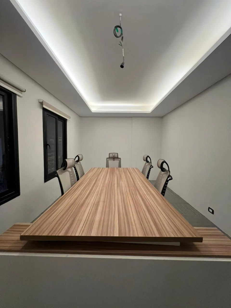 Meeting room B-3 with a long table and chairs