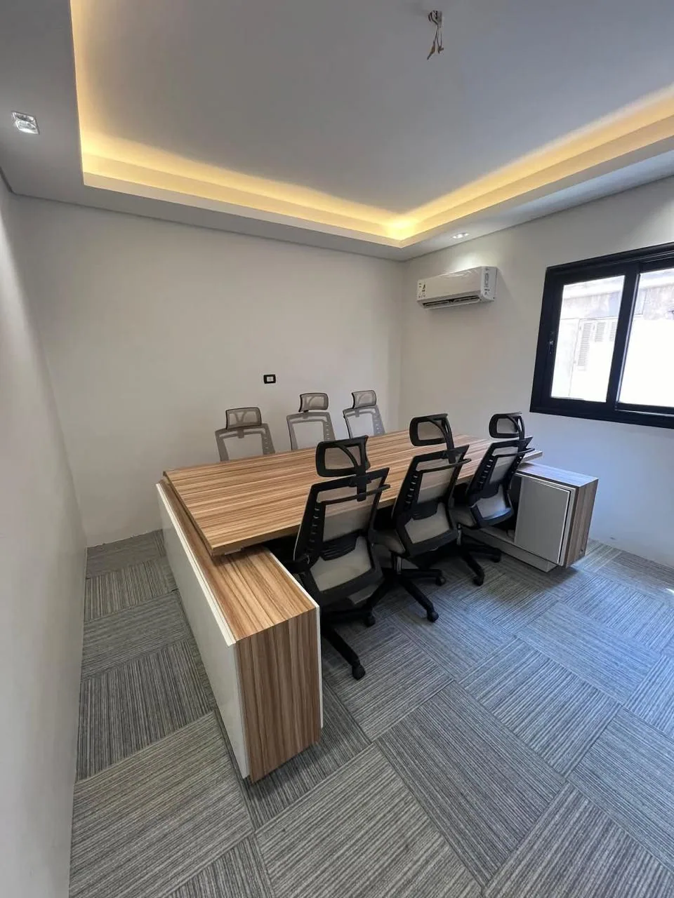 Administrative office C-4 with several desks and chairs