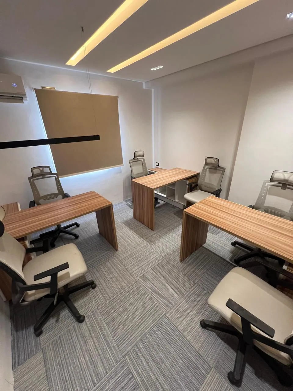 Administrative office C-5 with a window and desks